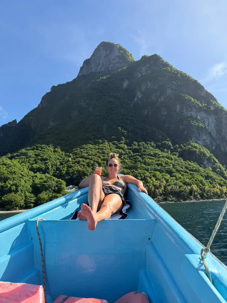 Guests travelling by boat along the St. Lucia coast